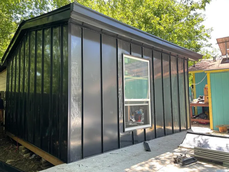 Black standing seam metal wall panels for Metal Roof Installation in Wasilla
