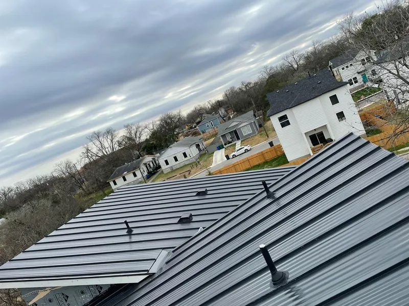 Standing seam metal roof panels with vents for Skylight Repair in Wasilla
